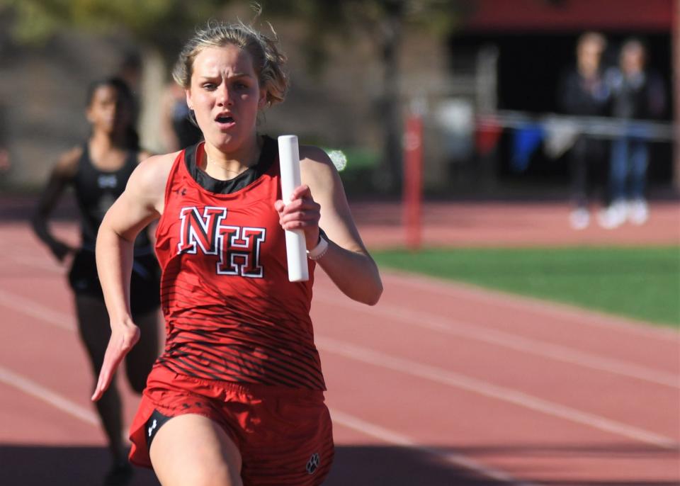 New Home's MaKenna Johnson competes in the girls 400-meter relay at the District 5-2A track meet Thursday, April 6, 2023, at Slaughter Field in Sundown.