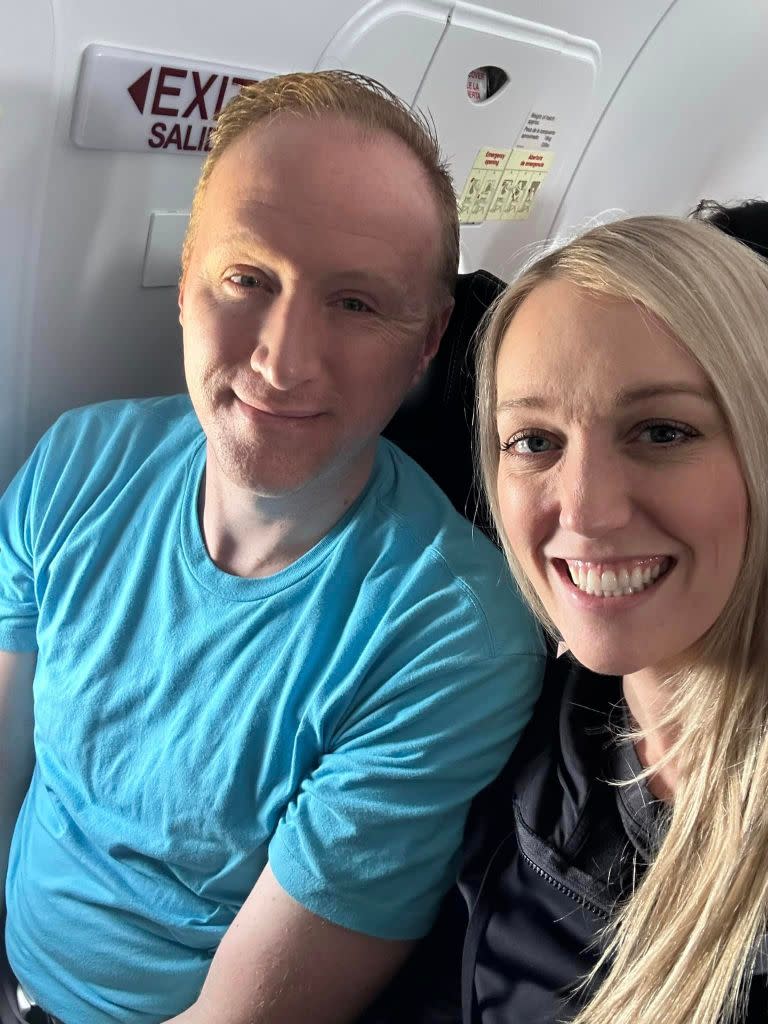 Clark and her husband are pictured flying to California to collect the kitty. Courtesy Carrie Stevens Clark