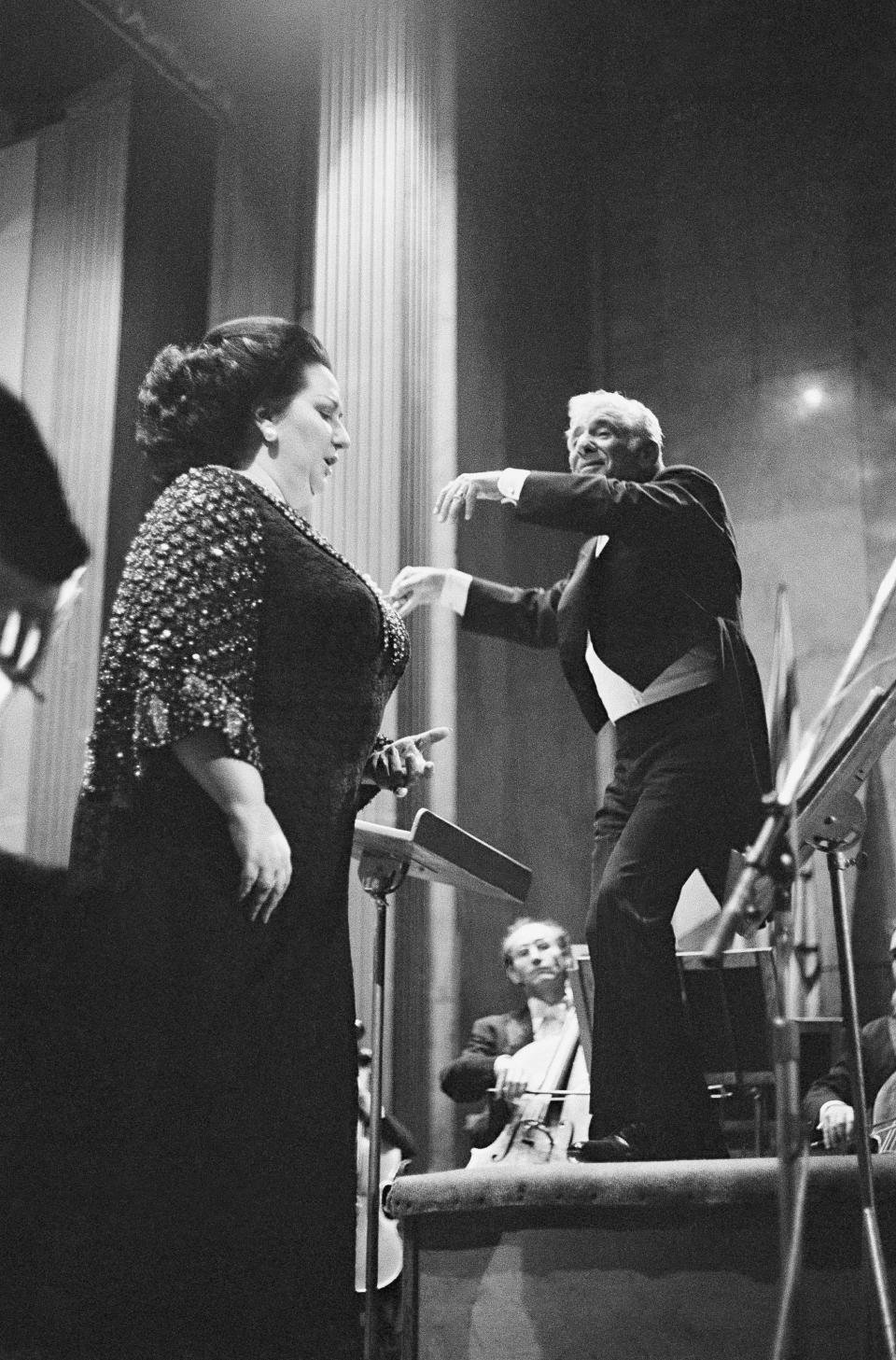 FILE - In this May 5, 1977 file photo, together for the first time on stage, American conductor Leonard Bernstein, right, at the head of the French National Orchestra and Spanish cantatrice Montserrat Caballe during the gala concert for the benefit of cancer research at the Champs-Elysees theater in Paris. Spanish opera diva Montserrat Caballe, renowned for her bel canto technique and her interpretations of the roles of Rossini, Bellini and Donizetti, has died. She was 85. Hospital Sant Pau press officer Abraham del Moral confirmed her passing away early on Saturday Oct. 6, 2018. (AP Photo)