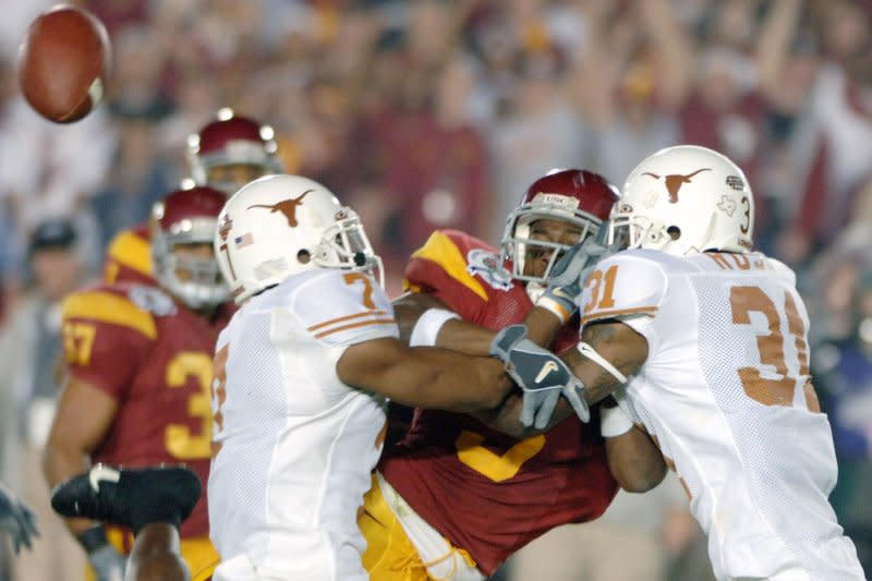 University of Southern California legend Reggie Bush (C) was a two-time All-American. File Photo by Phil McCarten/UPI