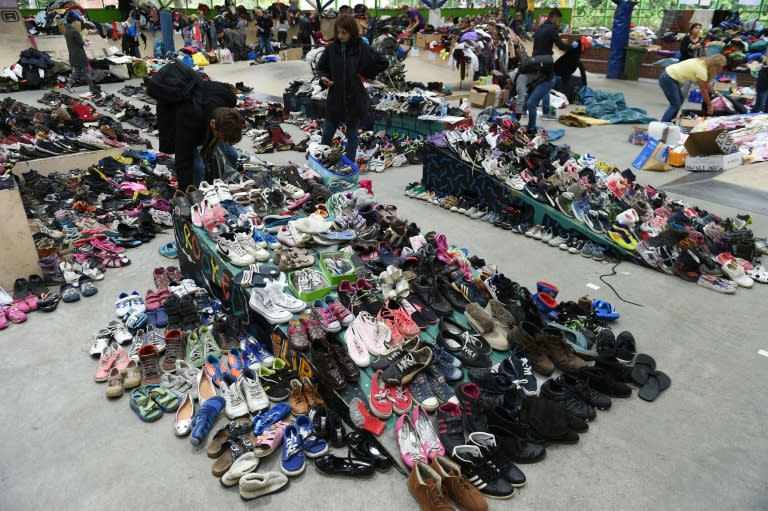 Shoes and clothes collected for migrants are collected at a community center near the train station in Dortmund, Germany, on September 6, 2015