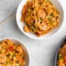 <p>If you love prawns, make them spicy with an easy sauce of Sriracha and lime juice.</p><p>Get the <a href="https://www.delish.com/uk/cooking/recipes/a28756874/sriracha-shrimp-noodles-recipe/" rel="nofollow noopener" target="_blank" data-ylk="slk:Sriracha Prawns with Noodles" class="link rapid-noclick-resp">Sriracha Prawns with Noodles</a> recipe.</p>