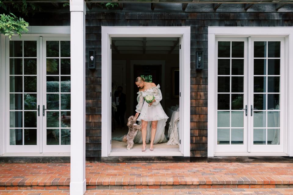 The Bride and Groom Said Their Vows Beneath a Floral Chuppah at This Hamptons Backyard Wedding