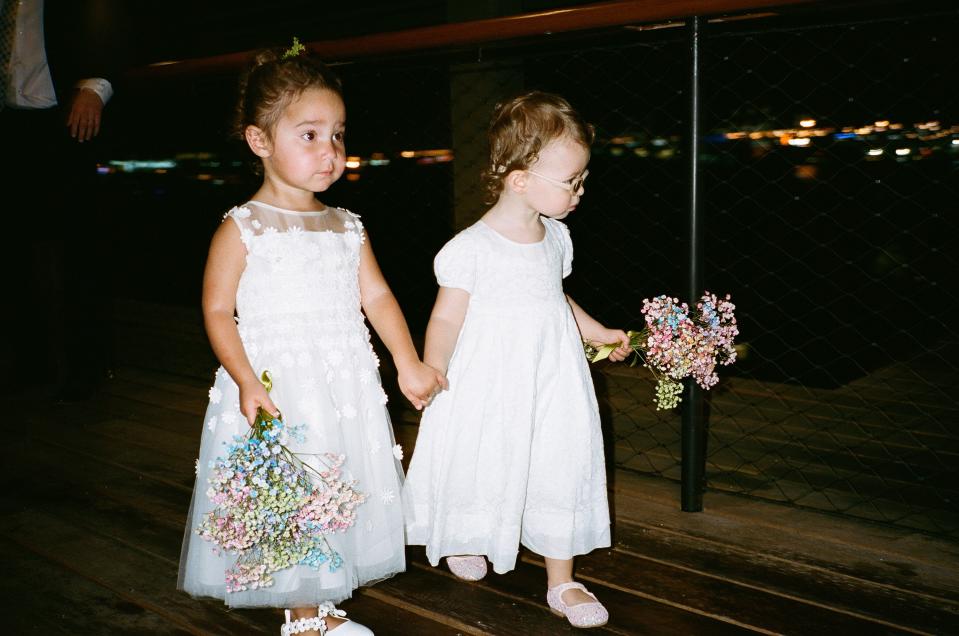 Our beautiful flower girls/nieces Ruby Lou and Kaia Sylvie. They were practicing all weekend and could not have been cuter. BRRCH Floral made the most adorable baby’s breath bouquets that she spray-painted different colors.