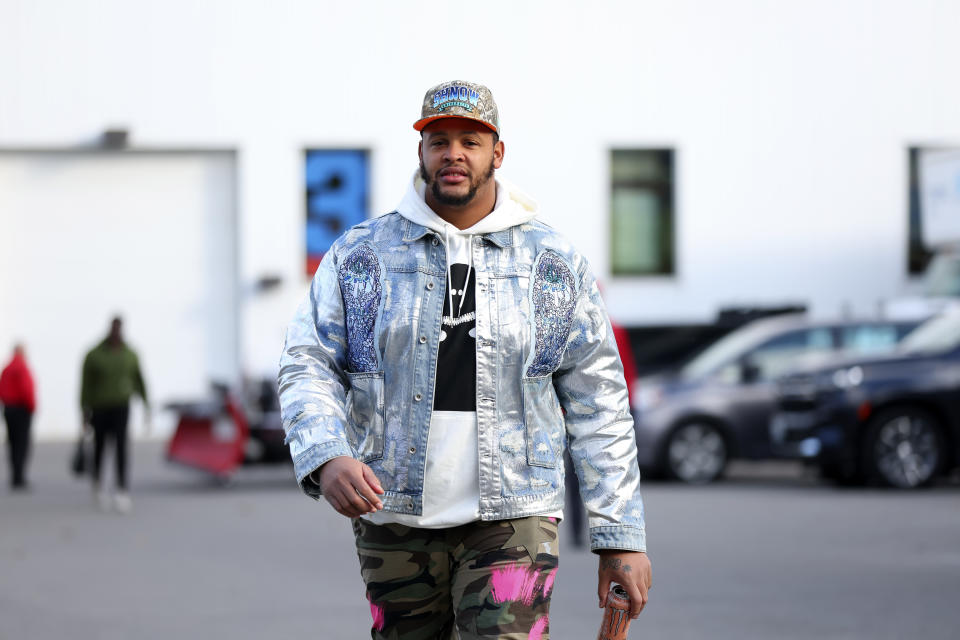 Buffalo Bills offensive tackle Dion Dawkins arrives for the team's NFL football game against the New York Jets in Orchard Park, N.Y., Sunday, Nov. 19, 2023. (AP Photo/Jeffrey T. Barnes )