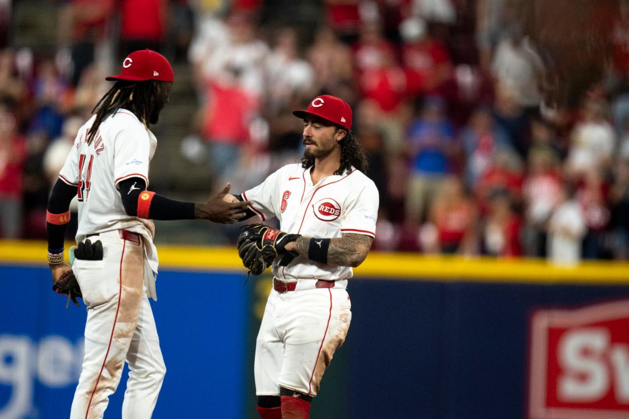 The Reds take on the Cardinals Aug. 12-14 at Great American Ball Park. Pictured: Reds shortstop Elly De La Cruz (44) and second baseman Jonathan India (6) greet each other after the Cincinnati Reds defeated the San Francisco Giants 6-4 on Saturday, Aug. 3, 2024.