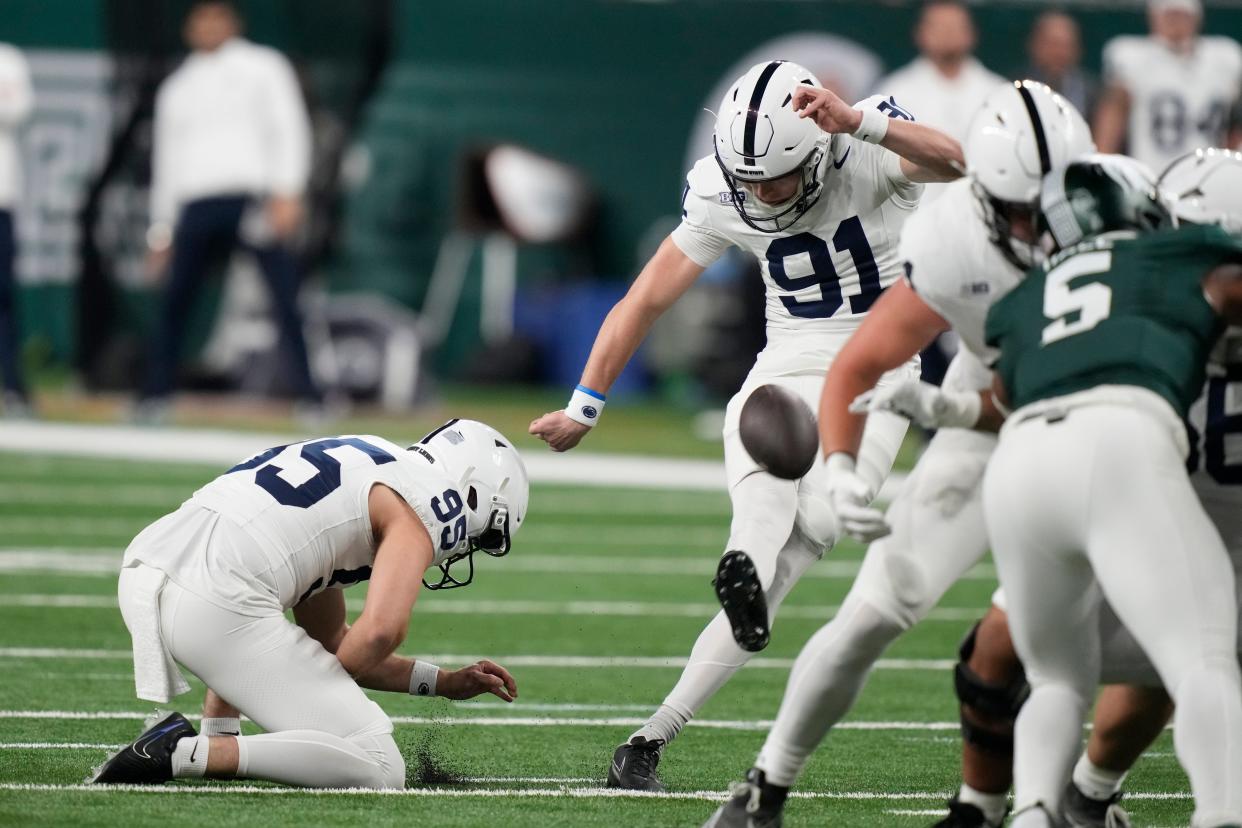 Penn State place-kicker Alex Felkins (91) kicks a field goal during the first half against Michigan State at Ford Field in Detroit on Friday, Nov. 24, 2023.