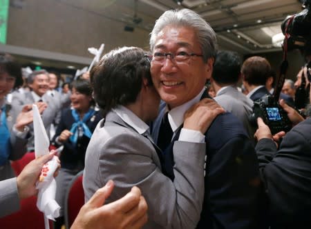 FILE PHOTO : Japan's Olympic Committee President Tsunekazu Takeda celebrates as Jacques Rogge President of the International Olympic Committee announces Tokyo as the city to host the 2020 Summer Olympic Game during a ceremony in Buenos Aires