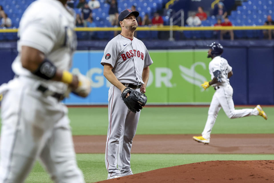 Boston Red Sox starting pitcher Rich Hill reacts after giving up a three-run home run to Tampa Bay Rays' Randy Arozarena during the first inning of a baseball game Tuesday, Sept. 6, 2022, in St. Petersburg, Fla. (AP Photo/Mike Carlson)