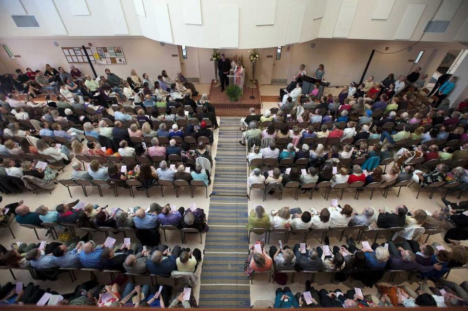 Members of the Spiritual Life Center of Sacramento hold their Easter morning services at the Sacramento Area League of Associated Muslims auditorium next to SALAM’s mosque in 2012. Moran, who co-founded Spiritual Life Center, died March 24 at his home in Idaho. He was 75.