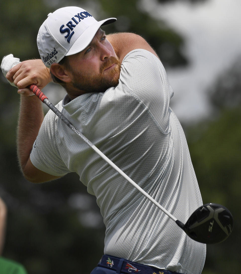 Zack Sucher hits off the 1st tee during the third round of the Travelers Championship golf tournament, Saturday, June 22, 2019, in Cromwell, Conn. (AP Photo/Jessica Hill)