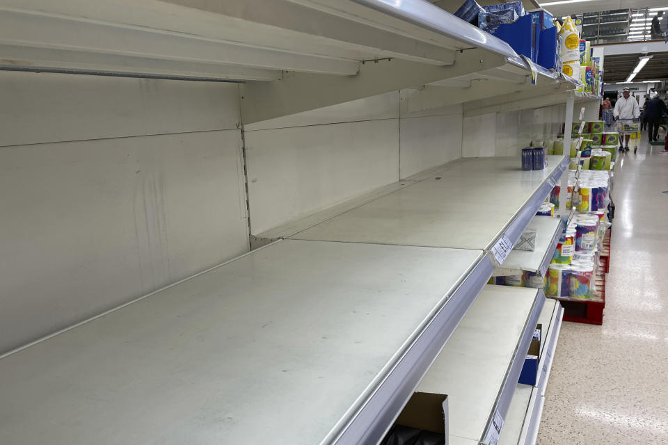 A view of empty shelves at a supermarket in London, Monday, Sept. 20, 2021. Retailers, manufacturers and food suppliers have reported disruptions due to a shortage of truck drivers linked to the pandemic and Britain's departure from the European Union, which has made it harder for many Europeans to work in the U.K. (AP Photo/Frank Augstein)