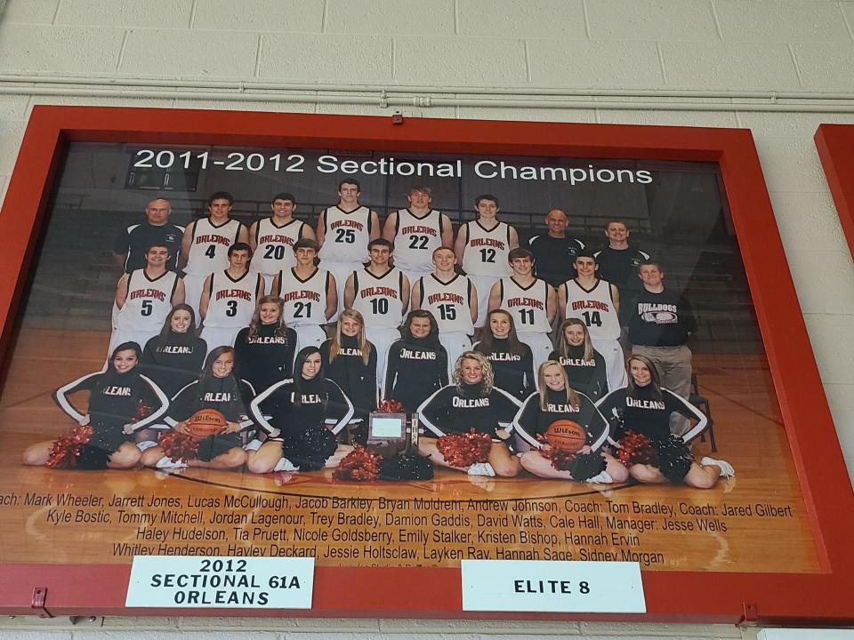 Photo of Orleans’ 2012 sectional championship team. Coach Tom Bradley’s son, Trey (10), was a standout player for the Bulldogs