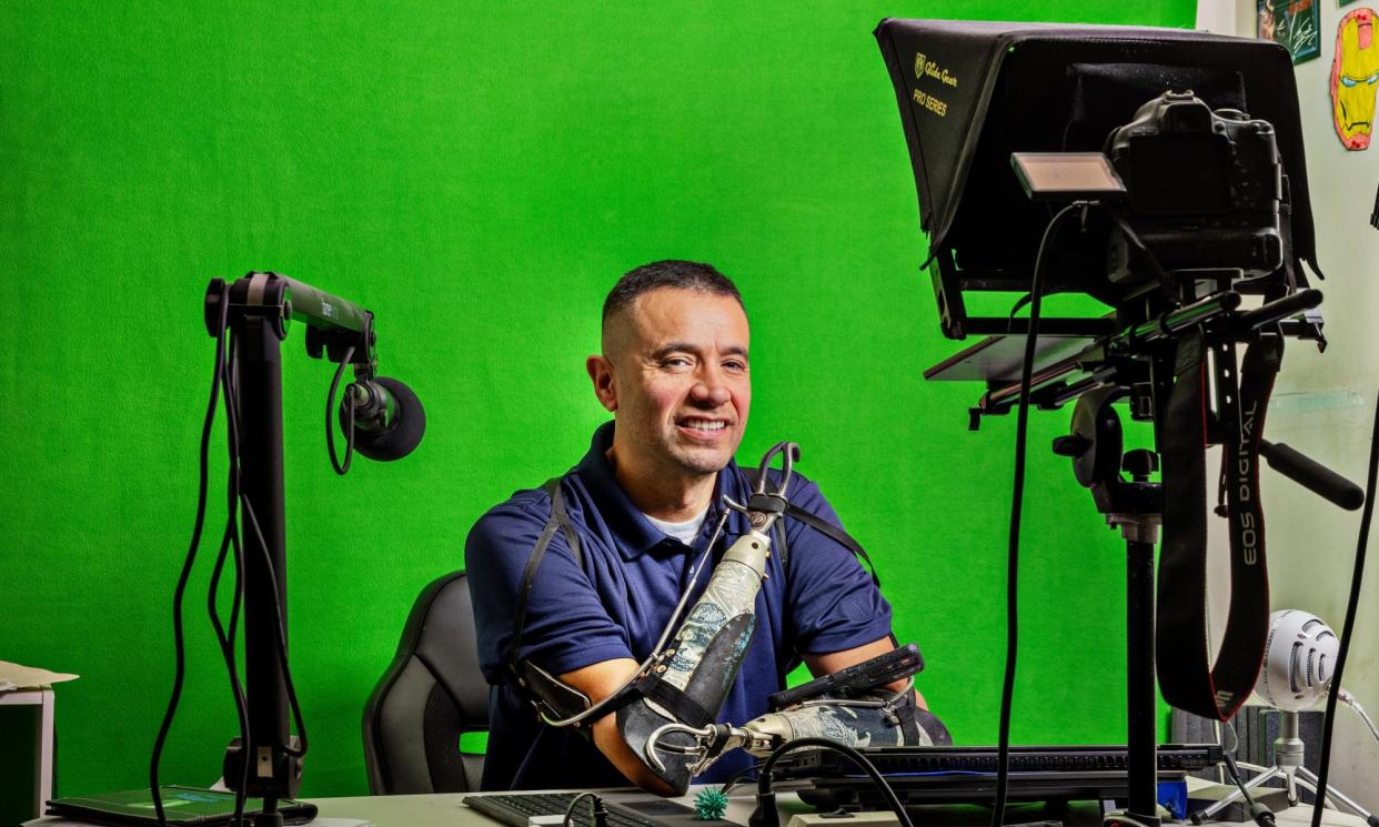 <span>‘I realised other people probably needed help, too’: Samoana Matagi in the home studio where he makes YouTube videos for other amputees.</span><span>Photograph: Kim Raff/The Guardian</span>