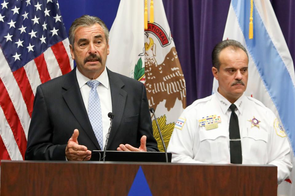 Former Los Angeles Police Chief Charlie Beck, left, who was named interim police superintendent in Chicago by Mayor Lori Lightfoot, addresses a news conference with First Deputy Superintendent Anthony Riccio, right, Tuesday, Dec. 3, 2019.