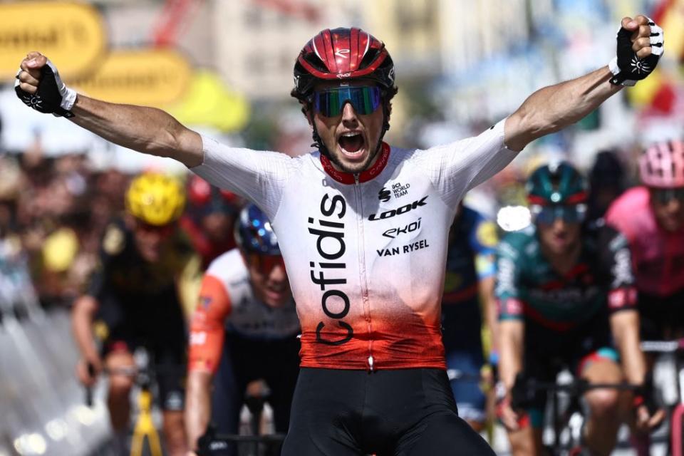 TOPSHOT  Cofidis French rider Victor Lafay celebrates as he cycles to the finish line to win the 2nd stage of the 110th edition of the Tour de France cycling race 2089 km between VitoriaGasteiz and San Sebastian in northern Spain on July 2 2023 Photo by AnneChristine POUJOULAT  AFP Photo by ANNECHRISTINE POUJOULATAFP via Getty Images