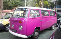 This participant really went all out and came to the event in this groovy pink Volkswagen minivan, reminiscent of the 1960s. (Yahoo! photo/Melissa Law)