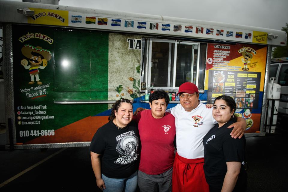 Zully Sherpinskas, left to right, Dulce Saucedo, Josef Lemus and Jasmine Lamboy run the Taco Arepa food truck. Other members not pictured are Elydia Doane, Crystal Doane and Zulma Navida.