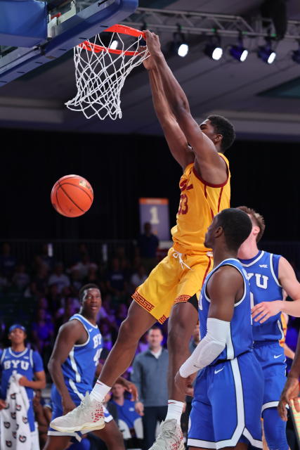 In a photo provided by Bahamas Visual Services, Southern California's Kijani Wright dunks against BYU during an NCAA college basketball game in the Battle 4 Atlantis at Paradise Island, Bahamas, Wednesday, Nov. 23, 2022. (Tim Aylen/Bahamas Visual Services via AP)