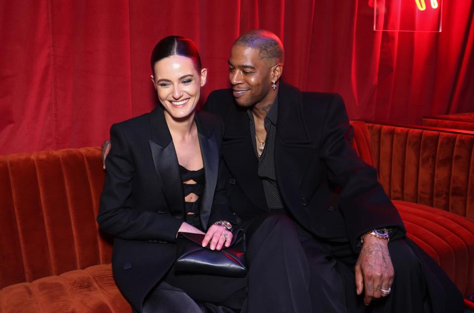 Lola Abecassis, left, and Kid Cudi at the premiere of "Knuckles" on April 16, 2024 in London, England.