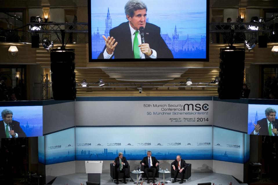 US Secretary of Defense Chuck Hagel , center, and Wolfgang Ischinger, right, chairman of the Munich Security Conference, listen as US Secretary of State John Kerry, left, speaks during the Munich Security Conference at the Bayerischer Hof Hotel Saturday Feb. 1, 2014 in Munich, southern Germany. The annual meeting was set to deal with thorny international issues, from the Syrian war and Ukraine's turmoil to Iran's nuclear program and US online surveillance. (AP Photo/Brendan Smialowski,Pool)