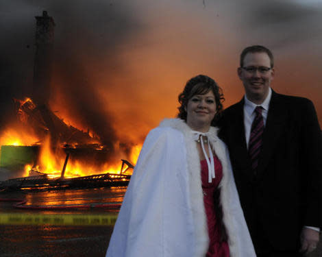 Nancy and Mike Rogers pose while their wedding plans go down in flames.