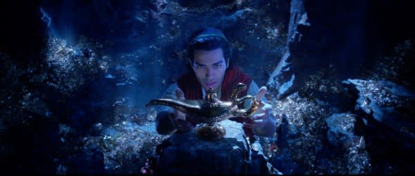 Aladdin (Mena Massoud) acquires the magic lamp in Aladdin. Credit: Walt Disney Pictures