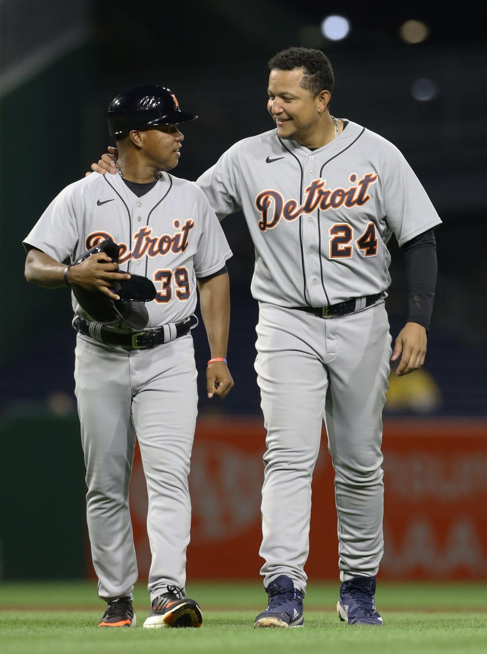 Tigers third base coach Ramon Santiago and first baseman Miguel Cabrera on Sept. 8, 2021.