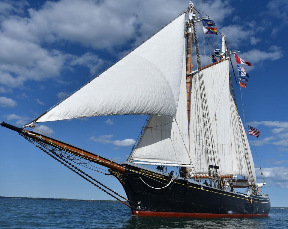 A big sky shows off the lines of the tall ship Ernestina-Morrissey sailing from MMA heading to New Bedford.