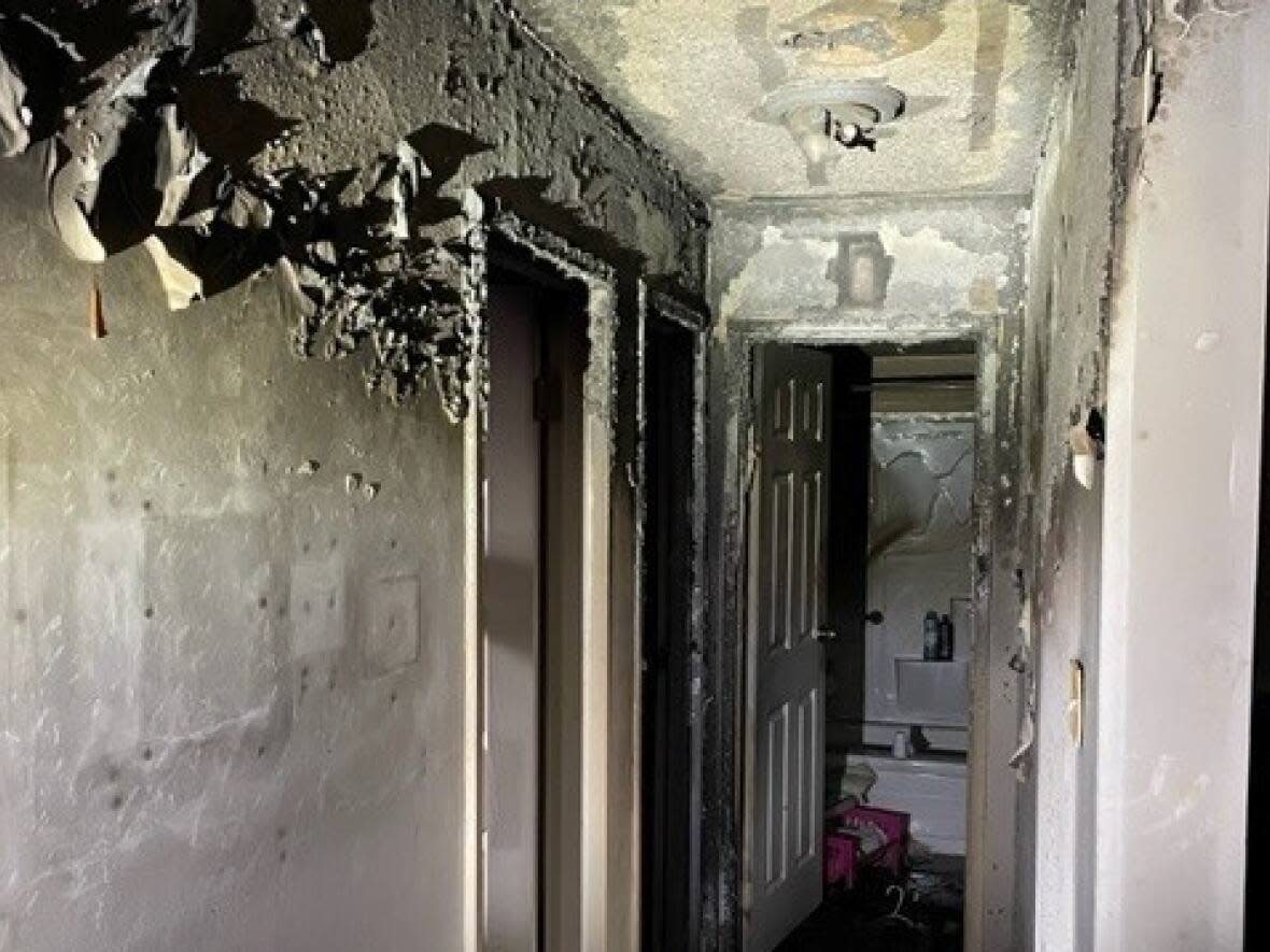 A man was trapped in a bedroom during a fire in the Lakeview neighbourhood Sunday morning, the Saskatoon Fire Department said.  (Saskatoon Fire Department - image credit)
