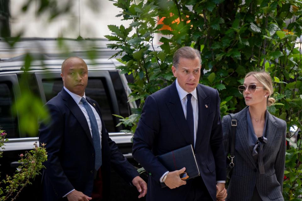 Hunter Biden enters the J. Caleb Boggs Federal Building with his wife, Melissa Cohen Biden, in Wilmington, Delaware, on Monday, June 3, 2024.