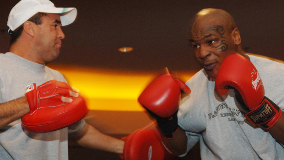 Jeff Fenech and Mike Tyson, pictured here at Planet Hollywood Resort and Casino in Las Vegas.