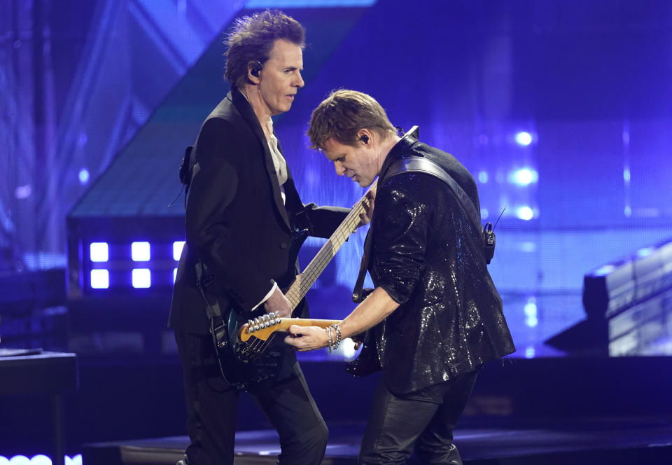 Inductees John Taylor, left, and Roger Taylor of Duran Duran perform during the Rock & Roll Hall of Fame Induction Ceremony on Saturday, Nov. 5, 2022, at the Microsoft Theater in Los Angeles. (AP Photo/Chris Pizzello)
