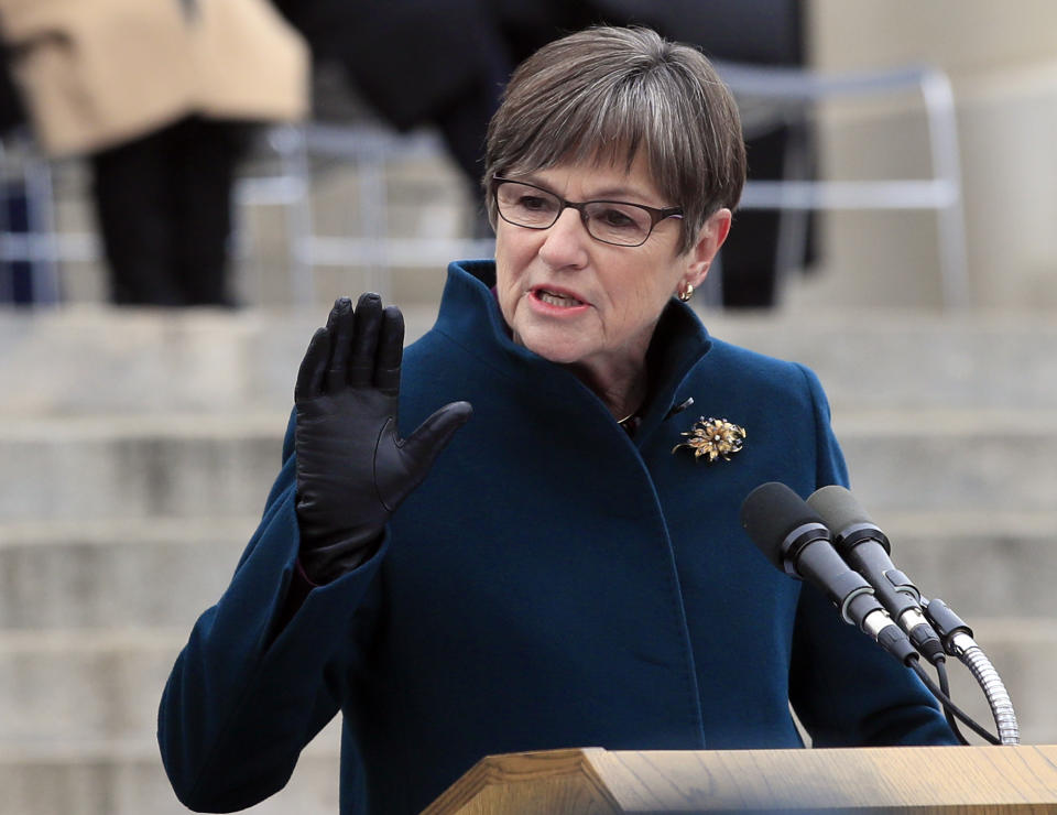 Gov. Laura Kelly delivers her inaugural address on the Statehouse steps in Topeka, Kan., Monday, Jan. 14, 2019. (AP Photo/Orlin Wagner)