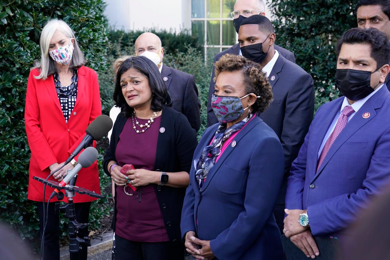 Rep. Pramila Jayapal, D-Wash., the chair of the Congressional Progressive Caucus, second from left, talks with reporters outside the West Wing of the White House in Washington, Tuesday, Oct. 19, 2021, following a meeting with President Joe Biden. She is joined by, from left, Katherine Clark, D-Mass., Rep. Mark Pocan, D-Wis., Rep. Barbara Lee, D-Calif., Rep. Ritchie Torres, D-N.Y., Rep. Jared Huffman, D-Calif., partially hidden,Rep. Jimmy Gomez, D-Calif., and Rep. Ro Khanna, D-Calif., right. (AP Photo/Susan Walsh) ORG XMIT: DCSW108