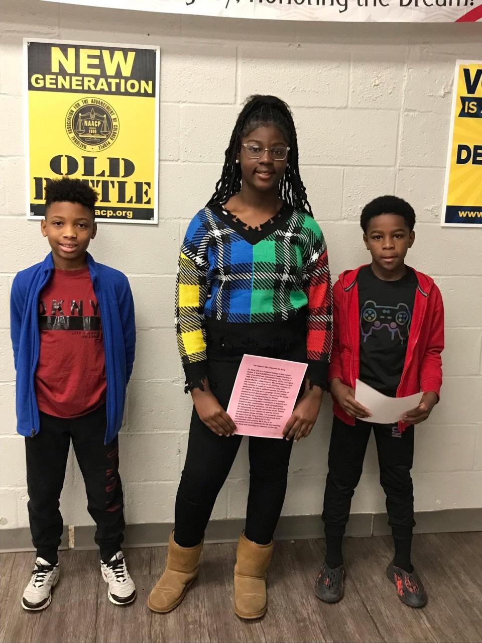 The winners of Lafourche Parish NAACP essay contest, Monday, January 15. From left to right: Ci're Spot, Harmony Davis, and Jayven Davis.