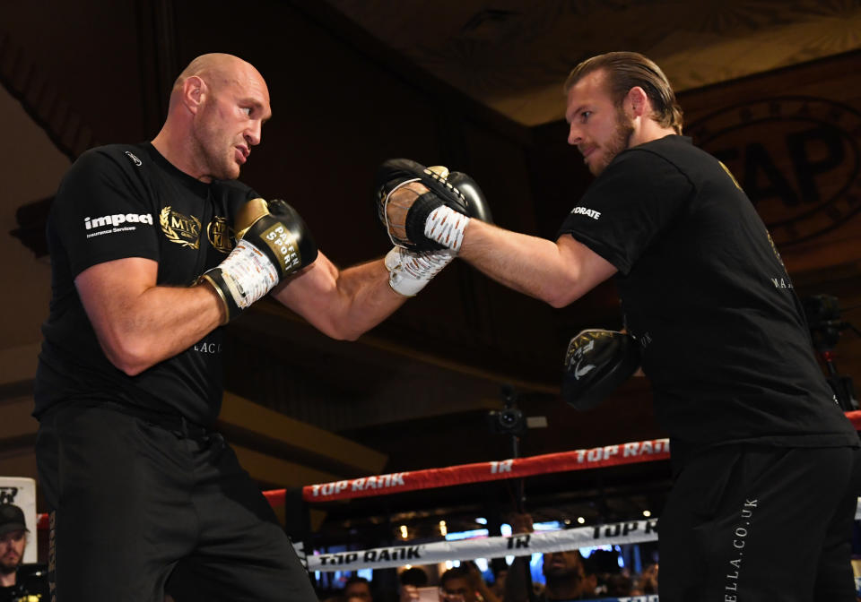 LAS VEGAS, NEVADA - JUNE 11:  Boxer Tyson Fury (L) works out with his trainer Ben Davison at MGM Grand Hotel & Casino on June 11, 2019 in Las Vegas, Nevada. Fury will face Tom Schwarz in a heavyweight bout on June 15 at MGM Grand Garden Arena in Las Vegas.  (Photo by Ethan Miller/Getty Images)