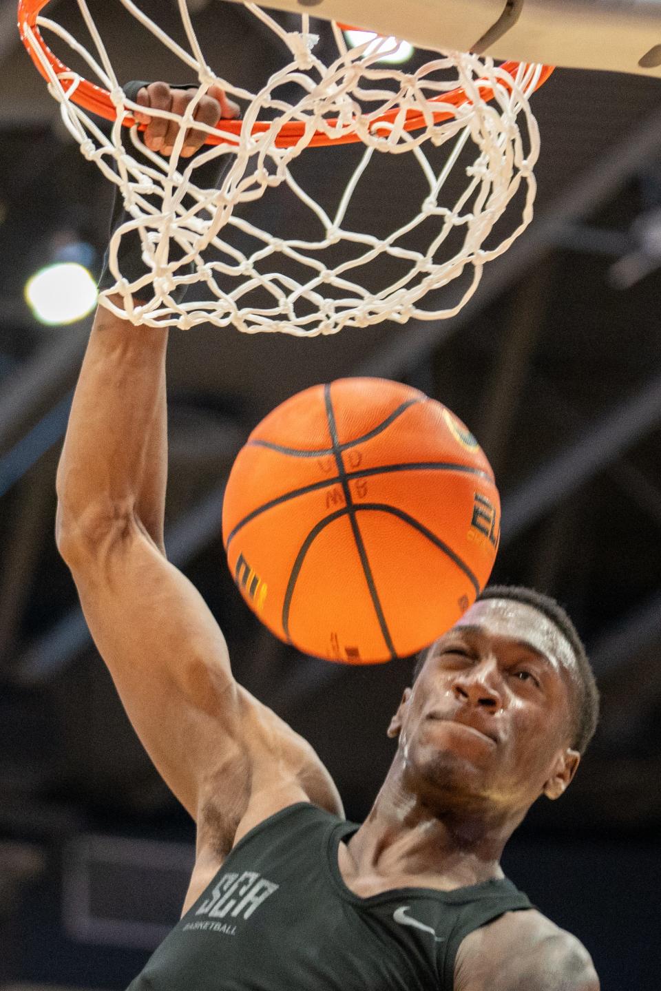 Oct 22, 2023; Dayton, OH, USA;
Ohio State Buckeyes guard Scotty Middleton (0) dunks during warm-ups before their game against the Dayton Flyers on Sunday, Oct. 22, 2023 at University of Dayton Arena.