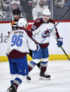 Colorado Avalanche's Artturi Lehkonen (62) celebrates his goal against the Winnipeg Jets with Mikko Rantanen (96) during the second period in Game 2 of an NHL hockey Stanley Cup first-round playoff series Tuesday, April 23, 2024, in Winnipeg, Manitoba. (Fred Greenslade/The Canadian Press via AP)