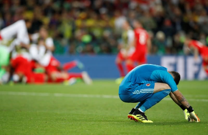 <p>Colombia’s David Ospina looks dejected after losing the penalty shootout. REUTERS/Carl Recine </p>