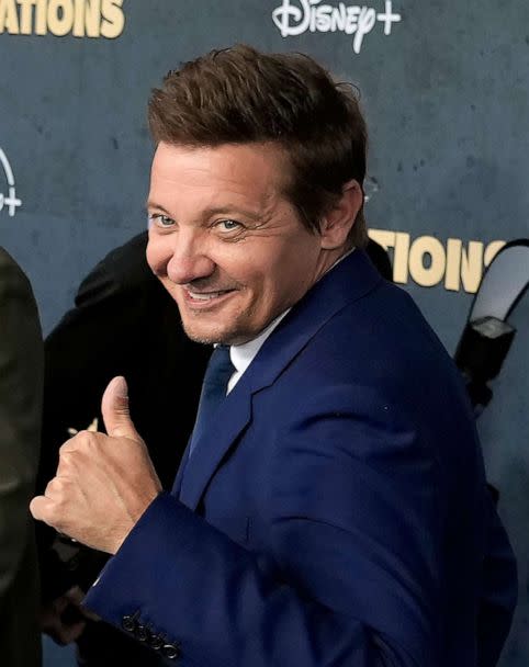 PHOTO: Jeremy Renner, the host and executive producer of 'Rennervations,' gives a thumbs-up to photographers at the premiere of the four-part Disney+ docuseries, April 11, 2023 in Los Angeles. (Chris Pizzello/Invision/AP)