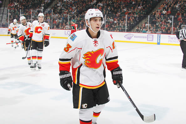 ST. PAUL, MN - NOVEMBER 15: Johnny Gaudreau #13 of the Calgary Flames celebrates after scoring a goal against the Minnesota Wild during the game on November 15, 2016 at the Xcel Energy Center in St. Paul, Minnesota. (Photo by Bruce Kluckhohn/NHLI via Getty Images)