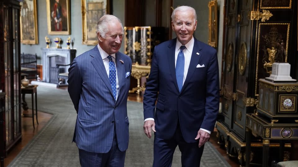 WINDSOR, ENGLAND - JULY 10: King Charles III and US President Joe Biden pose in the Grand Corridor at Windsor Castle on July 10, 2023 in Windsor, England.  - Andrew Matthews/Pool/Getty Images