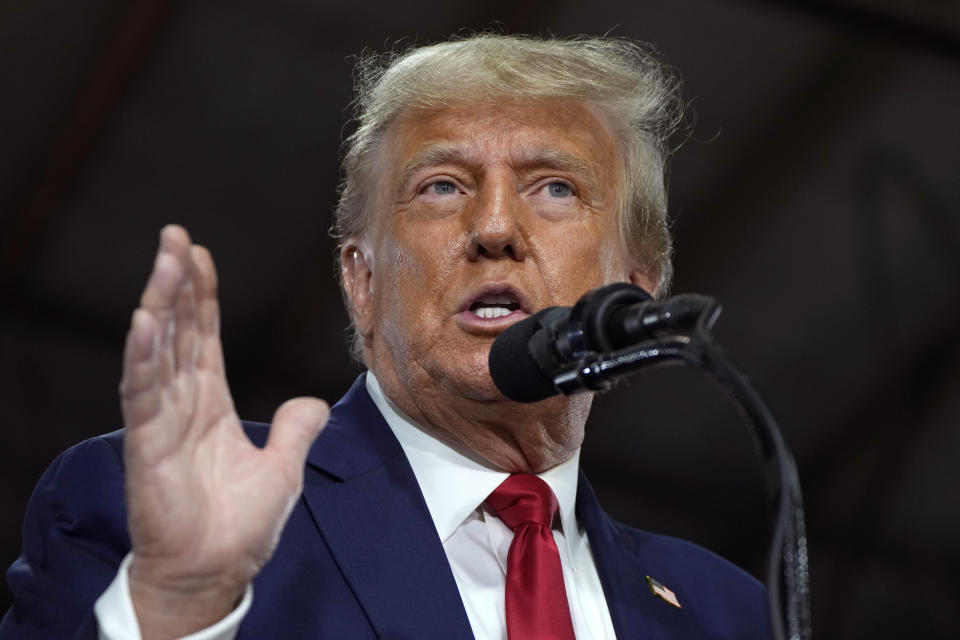 Former President Donald Trump speaks during a commit to caucus rally, Monday, Oct. 16, 2023, in Adel, Iowa. (AP Photo/Charlie Neibergall)