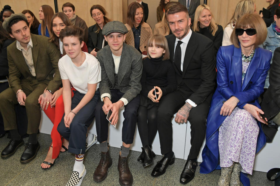 The Beckham children join their father (and Anna Wintour) to cheer on Victoria Beckham at the fashion show for her eponymous brand. (Getty Images)