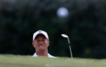 ATLANTA, GA - SEPTEMBER 20: Tiger Woods watches his bunker shot on the ninth hole during the first round of the TOUR Championship by Coca-Cola at East Lake Golf Club on September 20, 2012 in Atlanta, Georgia. (Photo by Kevin C. Cox/Getty Images)