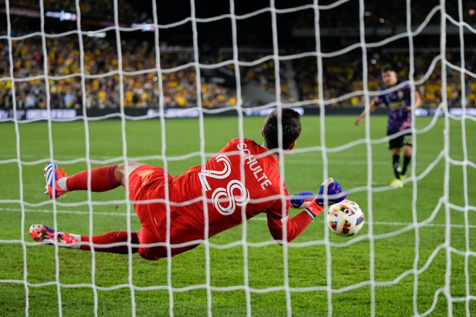 Sep 25, 2024; Columbus, Ohio, USA; Columbus Crew goalkeeper Patrick Schulte (28) makes a save during penalty kicks of the Campeones Cup Final against Club América at Lower.com Field. The Crew lost 5-4.