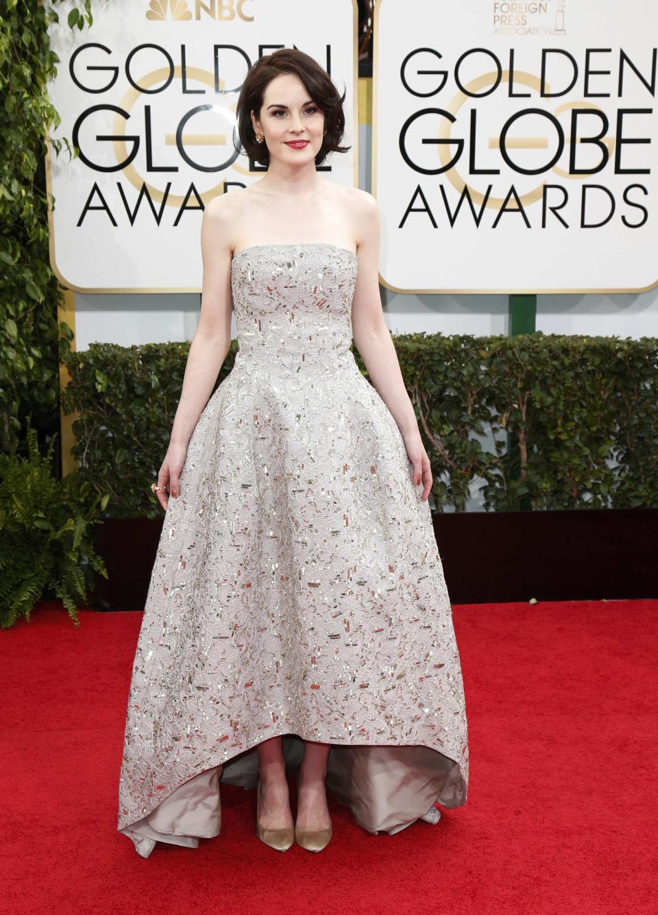 Actress Michelle Dockery arrives at the 71st annual Golden Globe Awards in Beverly Hills, California January 12, 2014. REUTERS/Danny Moloshok (UNITED STATES - Tags: Entertainment)(GOLDENGLOBES-ARRIVALS)