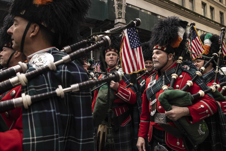 Members of a marching band prepare to march during the St. Patrick's Day Parade in New York, Friday, March. 17, 2023. (AP Photo/Yuki Iwamura)