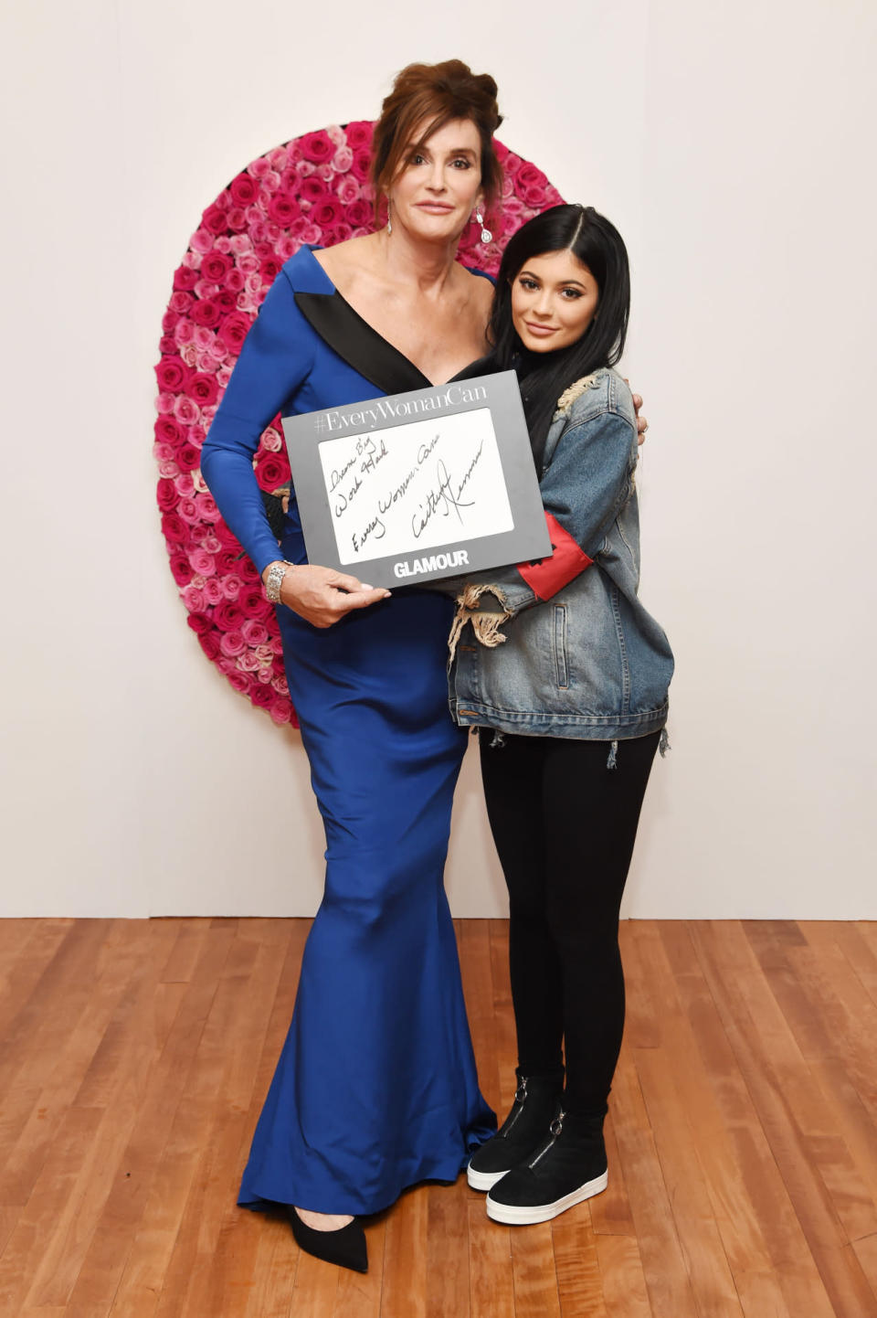 Caitlyn Jenner in a custom Jeremy Scott gown with her daughter Kylie Jenner backstage at the 2015 Glamour Women Of The Year Awards.